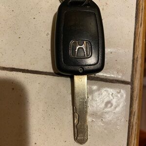 Honda CRV original manufacturer key with keyless unlock/lock fob 2009